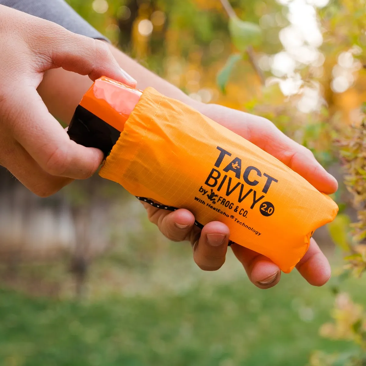 Tact Bivvy® 2.0 Emergency Sleeping Bag w/ HeatEcho®  Technology, Paratinder, & Whistle by Frog & CO