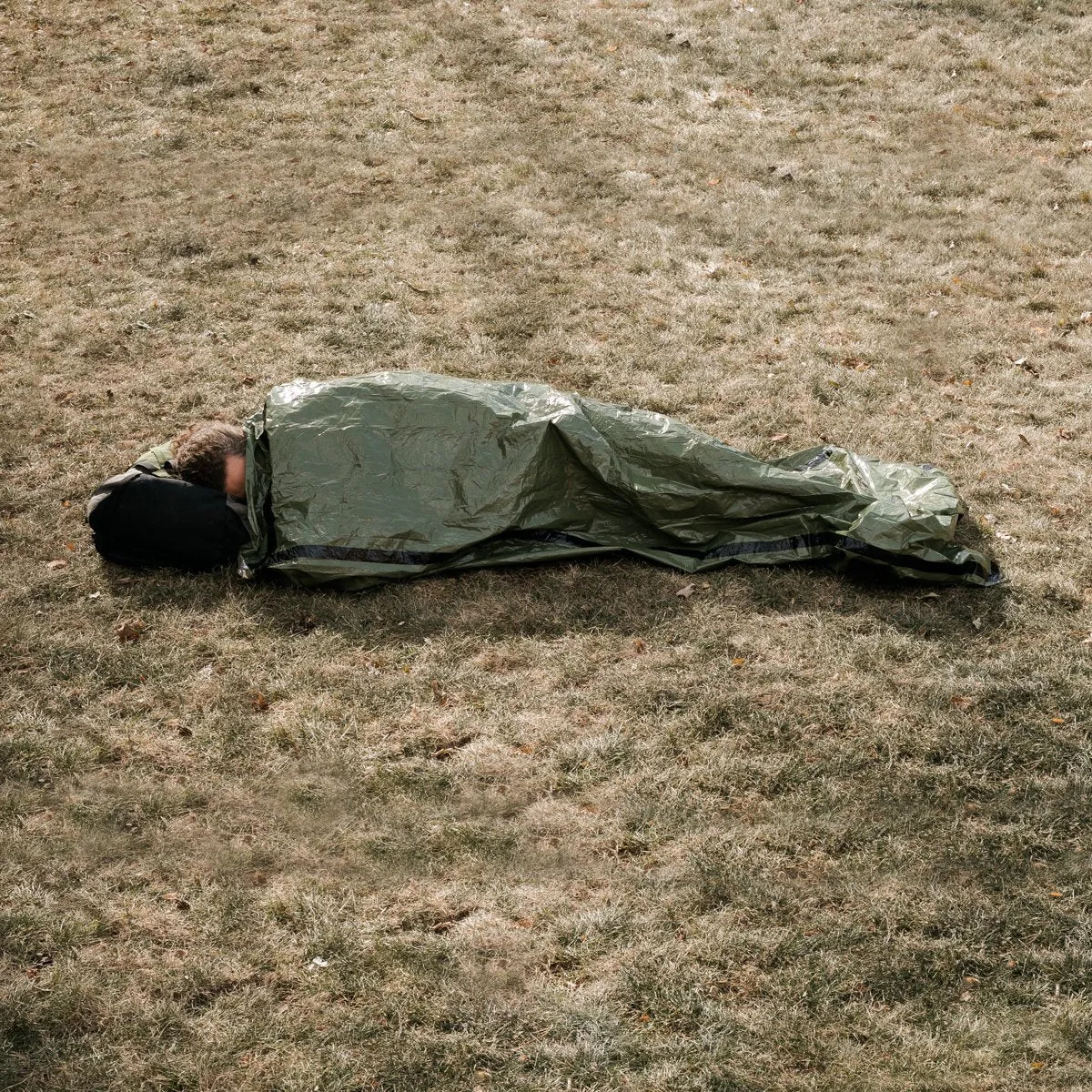 Tact Bivvy® 2.0 Emergency Sleeping Bag w/ HeatEcho®  Technology, Paratinder, & Whistle by Frog & CO